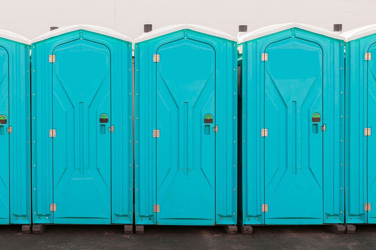 Industrial portable restroom units at a plant in Logan, Utah